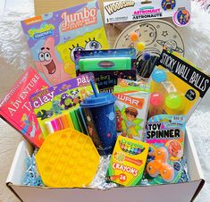 a box filled with lots of toys and books