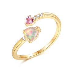 PRICES MAY VARY. This Adjustable Ring Made of 14K Yellow Gold Plated Base.Nickel Free, Lead Free. Ring Size : Adjustable (From US5 - US8) Main Stone: Heart Shape Created Pink Fire Opal Stone:4mm*4mm,Pink Cubic Zirconia:3mm*3mm.Ring Weight:1.4g Package:A wonderful small jewelry box. Easy storage and ready to be given as a gift. The opal will change the color and show unique flare of different light, It is mother's day, Christmas, Halloween, Valentine's day, Thanksgiving day,birthday and wedding f Adjustable Pink Rings For Mother's Day, Pink Opal Ring With Accent Stones As Gift, Heart Opal Ring, Pink Opal Ring In Sterling Silver For Gift, Adjustable Pink Opal Ring, Pink Opal Sterling Silver Ring Gift, Opal Stacking Ring, Pink Opal Ring, Fire Opals Jewelry