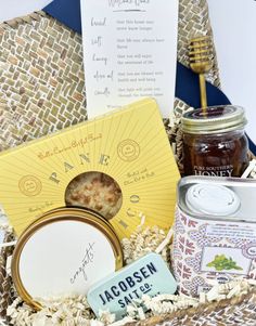 a basket filled with lots of food and some writing on the label next to it