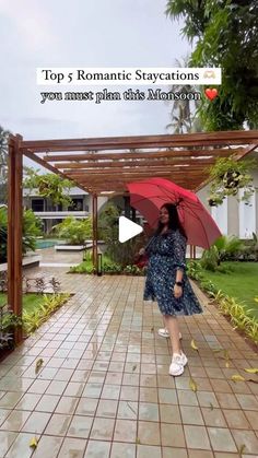 a woman walking down a walkway with an umbrella in her hand and the caption top 5 romantic stravations you can harness when planning this afternoon