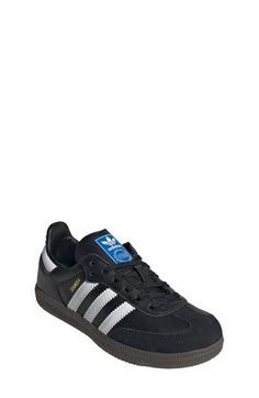 From the soccer field to the streets, this kid-size sneaker maintains its legacy with premium materials and iconic 3-Stripes at the sides. Lace-up style Removable insole Leather upper/synthetic lining/rubber sole Imported Unisex Shoes Sneakers, Adidas Kids, Up Styles, The Streets, Big Kids, Soccer Field, Rubber Sole, Leather Upper, Soccer