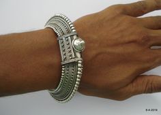 "Traditional design sterling silver bangle bracelet cuff from Rajasthan India. Great handmade design, Good for your jewellery collection. Note - Please check pictures carefully for more detail. Inner diameter side to side - 5.8 cm (2.28\") Inner circumference - 17.58 cm (6.9\") width - 2 cm Weight - 116 grams Material - Good sterling silver." Unique Sterling Silver Bangle Bracelet For Ceremonial Occasions, Unique Sterling Silver Bangle For Ceremonial Occasions, Unique Cuff Bangle For Wedding, Festival Gift Sterling Silver Bangle Bracelet, Artisan Bangle For Festivals As A Gift, Artisan Bangle As A Gift For Festivals, Handmade Sterling Silver Bangle For Ceremonial Occasions, Sterling Silver Bangle Bracelet For Festivals, Artisan Bangle As Festival Gift