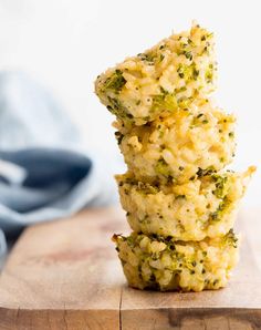 there are three muffins stacked on top of each other with broccoli florets