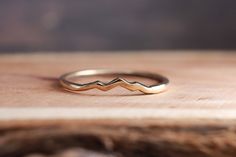 This Wedding Bands item by RuggedRingwear has 224 favorites from Etsy shoppers. Ships from Austin, MN. Listed on Jul 5, 2024 Mountain Wedding Band, Mountain Wedding Ring, Paua Shell Jewelry, Gold Mountain, Gold Liner, Mountain Ring, Dainty Band, Paua Shell, Ring Ideas