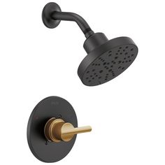 the delta shower faucet is shown in matte black with gold trim and handles