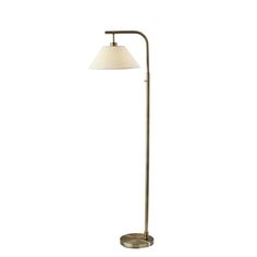 a floor lamp with a white shade on it