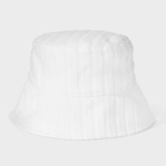 Bring a fun update to your sunny weather look with this Poly Jacquard Terry Bucket Hat from Shade & Shore™. Designed in a classic silhouette featuring a curved crown and a slanted brim, this bucket hat help keep the direct sun out of your eyes. Made from midweight fabric with soft lining for comfortable wear, it features a woven striped jacquard-knit outer in a solid hue, making it a great complement to a variety of casual ensembles. Shade & Shore™: Found exclusively at Target. Classic White Sun Hat For Summer, Spring Solid Color Bucket Hat, White Bucket Hat One Size Fits Most, White Sun Hat With Curved Brim For Spring, White Curved Brim Sun Hat For Spring, Classic Hats With Uv Protection For Spring, Classic Spring Bucket Hat With Short Brim, Classic Bucket Hat With Short Brim For Spring, Classic Summer Cotton Bucket Hat