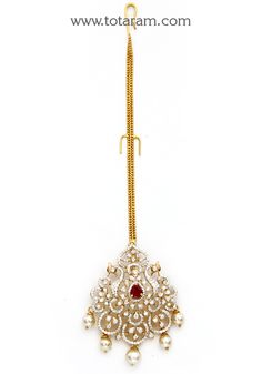 18 Karat Gold "Detachable - Peacock" Diamond Maang Tikka cum Pendant - Papidi Billa with Color Stones & South Sea Pearls
  This Product can be used as pendant.
  This product has Inter Changeable Stones in the pendant. 
  Gross Weight of the Pendant without Chain : 12.300 Grams
  Gross Weight of the Chain without Pendant : 1.950 Grams
  Length of the Pendant : 2.15 inches
  Width of the Pendant :  1.25 inches
 - 235-GT477 - in 14.250 Grams for USD $2,903.54 USD. 
Made in India by Totaram Jeweler Luxury Bollywood Pendant Jewelry, Luxury Gold Tikka With Stone Work, Luxury Tikka With Stone Work For Reception, Yellow Gold Kundan Jewelry For Puja, Red Peacock Design Jewelry For Wedding, Yellow Gold Kundan Pendant Necklace For Wedding, Wedding Yellow Gold Kundan Pendant Necklace, Gold Chandbali Jewelry With Peacock Design, Gold Chandbali With Peacock Design