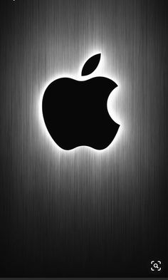 an apple logo on a metal background