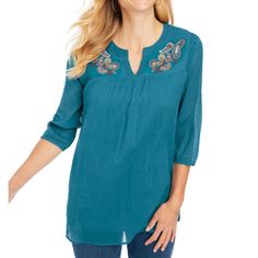 Description This Embroidered Gauze Tunic Is Figure Flattering With Gorgeous Crochet Lace In A Longer Length. The Three-Quarter Sleeves With Elasticized Hem Give This Lovely Gauze Top A Slight Peasant Sleeve Look. Easy Care And Easy Wear With Breezy Side Seam Vents, This Beautiful Tunic Has Got You Covered With Its Top-Notch Style! Embroidered Gauze Tunic. Figure Flattering In A Longer Length. Beautiful Embroidery And Crochet Lace. Banded Round Neckline With A V-Notch. Three-Quarter Sleeves With Casual Blue Embroidered Top With Neckline Detail, Casual Blue Embroidered Neckline Top, Casual Blue Blouse With Embroidered Hem, Casual Blue Top With Embroidered Neckline, Gauze Tunic, Gorgeous Crochet, Peasant Sleeve, Gauze Top, Tunic Shirt