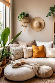 a living room filled with lots of furniture and plants