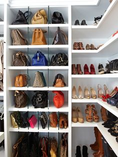 a white shelf filled with lots of different types of shoes