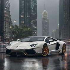 a white sports car parked in the rain