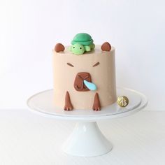 there is a cake with a turtle on it