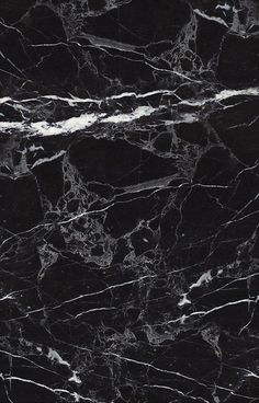 black and white marble textured wallpaper in an elegant pattern with silver veining