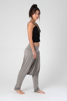 These comfortable boho Drop Crotch harem unisex pants are made of Lycra and are great to wear also while pregnant. These Harem Pants are chic, Stylish and always with a statement! It has a double Lycra band on top, which makes it easy to wear, The top part of the pant is Pleated and Not Gathered, which gives it a clean slim look! Suitable for summer and winter, all year round, Casual to Special occasions... Harem pants Women, Drop Crotch Pants, Long Unisex Comfortable Harem Pants, Grey Men's Har Stretch Harem Pants For Festivals, Stretch Harem Bottoms For Festival, Bohemian Relaxed Fit Trousers, Loose Fit Harem Pants For Festival, Loosely Fitted Harem Pants For Festivals, Stretch Hippie Harem Bottoms, Baggy Ankle-length Pants For Festival, Hippie Stretch Harem Bottoms, Relaxed Fit Hippie Harem Bottoms