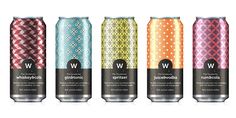 three cans of ww sparkling soda with different patterns and colors on the top, one is