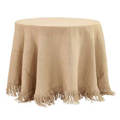 a round table with fringe trim around it