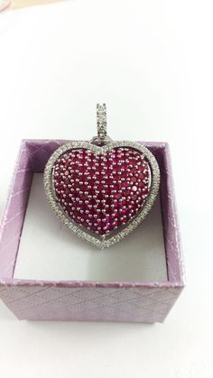 Pave Ruby And Diamond Heart Pendant Necklace, Ruby Heart Pendant, Gemstone Heart Pendant, Birthstone Heart Pendant, Big ruby Heart Pendant Main stone : Ruby Gemstone Creation : Lab Created Diamonds Secondary Stones : Cubic Zirconia Metal Purity: 925 parts per 1000 Cut: Very Good Metal: Sterling Silver ** PRODUCT CARE ** >> Keep your jewels safe in our box. >> When storing jewelry make sure it doesn't rub against other jewelry >> Though our jewelry doesn't turn black it is recommended to keep it Valentine's Day Double Heart Jewelry With Sparkling Stones, Valentine's Day Heart Jewelry With 17 Jewels, Valentine's Day Double Heart Sparkling Stones Jewelry, Valentine's Day Heart Necklace With 17 Jewels, Diamond Heart Necklace With Gemstone, Heart Necklace With Cubic Zirconia For Valentine's Day, Cubic Zirconia Heart Necklace With Gemstone, Heart Cut Birthstone Necklace For Valentine's Day, Valentine's Day Heart Cut Necklace With 17 Jewels