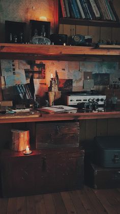 an old fashioned kitchen with lots of clutter