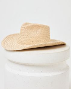 Giddy up, girlies! The Dakota Cowboy Hat is coming to town and we couldn't be more happy. The straw hat has a traditional cowboy brim to add a little country to any look. Pair it with one of our dresses and a pair of boots for an on-trend look. Straw hat Cowboy brim 100% Palm Style # LSDAK24