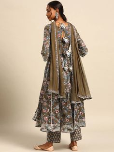 This is a beautiful 3-piece set. The set comes with floral print & gota patti detailing angrakha kurta has round neck, calf length and 3/4th sleeves teamed with printed trouser pants and a chiffon dupatta. Total No of Set-3 Kurta Fabric: Cotton Bottom Fabric - Cotton Dupatta Fabric-Chiffon Work Done - Gota Patti & Print Detailing. Sleeve Length: 3/4th Sleeves Color: Green Occasion: Party Wear Washing Instructions: Hand Wash or Dry Clean Angrakha Suit, Cotton Dupatta, Chiffon Dupatta, Cotton Bottoms, Suit Set, Trouser Pants, Green Cotton, Indian Wear, Online Retail