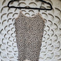 Yelete One Size Fits Most Leopard Print Tan Camis. I Have One Nwt New With Tags And One New Without Tags. Small, Medium, Large. There's A Lot Of Stretch But I Would Say It Would Fit A Size Small To A Large. Measurements Are: Strap Is 6 1/2" Flat Top Of Strap To Hem Normal Is: 25.5" Flat Top Of Strap Stretched Maximum: 40" Flat Width Flat Normal Is: 13" Flat Width Stretched Maximum: 25" Flat Thank You For Looking. Check Back Often As I'm Going Through Everything And Only Listing The Best I Have. Lace Bralette Top, Rose Tank Top, Black Seamless, Rosé Brown, Sage Color, Bralette Tops, Tank Top Camisole, Flats Top, Lace Bralette