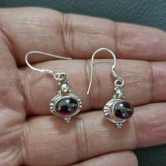 Stone is Garnet, and earrings are made in sterling silver. Dimension (approx) : Total drop :3.2 cm approx Width :1.2cm approx Earrings Stone, Birthstone Earrings, Garnet Earrings, Silver Dangle Earrings, Sterling Silver Dangle Earrings, Birthstone Earring, Silver Earrings Dangle, Earrings Sterling Silver, Stone Earrings