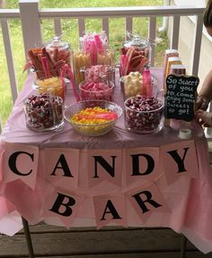 a candy bar is set up on the porch