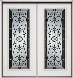 two metal doors with decorative designs on the glass and one has a white door frame