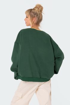 PRODUCT INFO Sweatshirt V neckline Dallas graphic Polyester, Rayon Model wears size S Model height is 5'6 Item care: Wash with similar color Visionary Fashion, Green Sweatshirt, Swimwear Dress, Pacsun, S Models, Dallas, Sweatshirts Women, Set Dress, Casual Looks