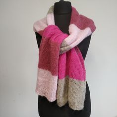 Striped gentle and warm mohair scarf in various shades of pink.  Product Details: 100% hand knit Measures:182cm x 28cm (72in x 11in). Weight: 71 g. Material: Brushed alpaca silk yarn: 77% alpaca, 23% silk. Care: Hand wash in cool water at 30oC (86oF), with delicate soap, do not dry in dryer, do not bleach. Gently pull into shape. Lay down on flat surface to dry. Hand Knitted Alpaca Scarves, Hand Knitted Alpaca Shawl Scarves, Pink One-size Winter Shawl, Pink One Size Shawl For Winter, One Size Pink Shawl For Winter, Handmade Pink Shawl As Gift, Winter Mohair Shawl Scarf, Pink Scarves As Gifts, Pink Shawl Scarf For Fall