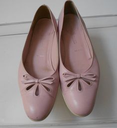 "Pink leather pumps Amalfi exclusive for Nordstrom Bow and three openings Clean and comfortable Normal wear sign but it's in great condition Dimension length 10.5\" ball of foot 3.5\" heel 1\"" Pink Slip-on Ballet Flats For Summer, Pink Almond Toe Ballet Flats, Pink Bow Ballet Flats For Spring, Pink Spring Ballet Flats With Bow, Pink Ballet Flats With Bow For Spring, Feminine Pink Slip-on Ballet Flats, Feminine Pink Ballet Flats, Pink Spring Ballet Flats, Pink Ballet Flats For Spring