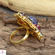 Tanzanite Gemstone Ring, Ruby Gemstone Ring, Sapphire Gemstone Ring, Pave Diamond Jewelry, 925 Silver Jewelry, Gold Vermeil Jewelry, Gifts Gross Weight: 16.34 gram Diamond Weight: 1.20 cts Gemstone Weight: 16.85 cts Ring Size: 38X34 MM NOTE:- All The Products Are Designed And Manufactured In My Workshop By Me & My Team. Shown Products Are Purely Handmade. Custom Orders Are Open Handly Accepted. We Are the Perfect Choice For Any Custom Jewelry Manufacturing. For Bulk Orders Please Message me. Anniversary Flower Ring With Cubic Zirconia Gemstone, Exquisite Multi-stone Gemstone Ring, Unique Anniversary Rings With Gemstone Accents, Formal Gemstone Flower Ring, Cluster Ring With Gemstone Accents As A Gift, Exquisite Stone Setting Rings For Gift, Exquisite Rings With Stone Setting For Gifts, Exquisite Rings With Stone Setting As Gift, Exquisite Gemstone Rings