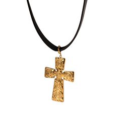 This black cord choker necklace with a cross pendant is perfect for adding an edgy and unique touch to any outfit. The black cord is comfortable to wear and the cross pendant adds a touch of spiritual significance. Length: 14.5" with a 2" extension chain attached Width: 7mm Material: Stainless Steel, Leather Plating: 18k real gold Gold Skull Necklace, Cross Necklace Black, 2024 Jewelry, Cord Choker, Rustic Cross, Cross Choker, Gold Skull, Gold Vermeil Jewelry, Christmas Gift List