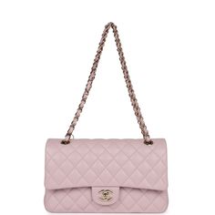 This Medium Classic Double Flap bag is in Light Pink caviar leather with light gold tone hardware and features a front flap with signature CC turnlock closure, half moon back pocket, and adjustable interwoven light gold tone chain link and light pink leather shoulder strap.The interior is lined in Light Pink leather with the "love letter" zipper compartment underneath the first flap, an "outer" slit pocket under the second flap, and an interior compartment with two open pockets separated by a "l Chanel Box, Metallic Pink, Bag Light, Vuitton Bag, Sierra Leone, Flap Bag, Pink Leather, Lambskin Leather, Handbag Backpack