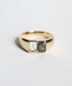 a close up of a ring on a white surface