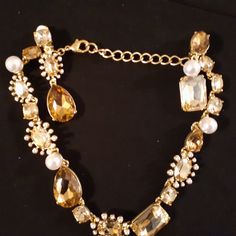 Signed Oscar De La Renta Signed Multi-Color Necklace & Earring Set Non Gem Champagne, Amber-Yellowish, And Faux Pearl Gold Tone Finish Lobster Claw Claps Adjustable Up To 18" Clip-On Earrings Just Over 3/4" X 3" Long Both The Necklace And Each Earring Are Signed On The Back (As Shown In The Photos) Price Is For Both The Necklace And The Earrings, Being Sold As A Set Nwot, Never Worn Yellow Jeweled Jewelry For Party, Formal Yellow Jeweled Jewelry, Elegant Yellow Jewelry With Sparkling Stones, Elegant Yellow Necklace For Party, Multi Coloured Necklaces, Color Necklace, Gold Cream, Necklace Earring Set, Lobster Claw