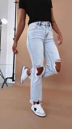 Our Stevie Straight Leg Denim is just in, a returning BEST SELLER for so many reasons. These jeans are oh so stretchy and incredibly comfortable. A denim staple that you will reach for again and again- our Stevie jeans are a trendy straight leg look that everyone needs! RISE 10.5"INSEAM 27.5" in size 3 RISE 13” INSEAM 27.5” in size 1XL 94.5% Cotton 4% Polyester 1.5% Spandex Fit: We suggest sizing down one size from your typical denim size in this style. Our Stevie Denim features an ideal amount of stretch, and a slimming high waisted design. Model Specs: Emily is wearing a size 1 in the photo. How will this item fit you? Check out our MODEL SPECS (Typical Sizing - Karli: S-Size 5/26 - 5ft 2in, Emily: S-Size 3/25 - 5ft 5in, Syd: L/XL- Size 15/ - 5ft 8in)Need help with sizing? No problem! Jo Jeans With Sequin Top Outfit, Simple Mom Jeans, Trendy Cute Jeans, Body Suit Outfits Fall Casual, Graphic Tees With Jeans, Cropped Distressed Jeans, Saturday Outfit Casual Weekend Wear 2024, Friday Night Casual Outfit, Jean Inspo Outfit