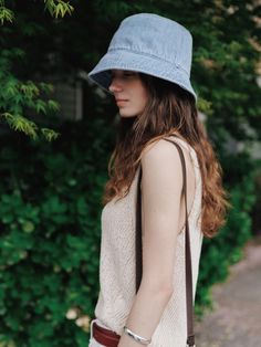 THE RYE's collection seeks to appropriately embody femininity and comfortable style in the hope that it will naturally blend into everyday life.- This is a denim bucket hat in a bright light blue color- It has a moderate depth and a not wide brim- It is made of 100% cotton yarn, providing a soft and comfortable touch- Bright colors add a casual feel Summer Denim Bucket Hat With Curved Brim, Spring Wide Brim Bucket Hat In Medium Wash, Spring Wide Brim Bucket Hat, Spring Denim Bucket Hat With Short Brim, Casual Denim Sun Hat For Summer, Casual Summer Denim Sun Hat, Casual Bucket Hat With Curved Brim In Medium Wash, Summer Denim Bucket Hat In Medium Wash, Summer Medium Wash Brimmed Bucket Hat