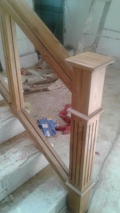 an unfinished stair case in the process of being installed