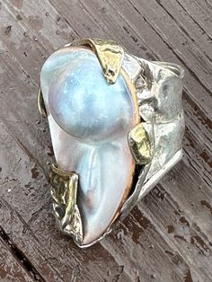 Mother of Pearl Sterling Silver with Gold swatches.  This ring was cast one of a kind in waxing design.   The size is 7 3/4. Lavender Stone, Pearl Rings Vintage, Cast Rings, Raw Stone Jewelry, Freshwater Pearl Jewelry, Sterling Silver Filigree, Rare Gemstones, Silver Filigree, Raw Stone