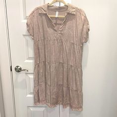 Zenana Dress. Nwot. Size S/M. Color Was Listed As Ash Mocha. Washed Fabric, Almost Gives A Taupe/Blush Color Vibe. V-Neck With Color. Sewn Cuff Sleeve. Pockets. Raw Edge. 25% Linen, 75% Rayon. Flowy Fit. Beige V-neck Rayon Dress, Casual Boho Short Sleeve Dress For Brunch, Casual Boho Dress With Short Sleeves For Brunch, Casual Beige Tiered Dress, Casual Boho Dress With Short Sleeves In Rayon, Casual Rayon Tunic Dress, Short Sleeve Rayon Sundress, Beige Shift Mini Dress With Short Sleeves, Short Sleeve Rayon Mini Dress For Day Out