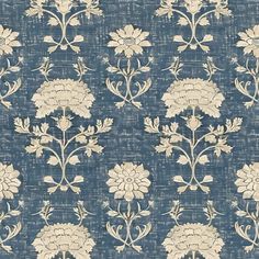 a blue and white wallpaper with flowers on it