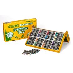 an open box of crayon classac construction pencils with the contents in it