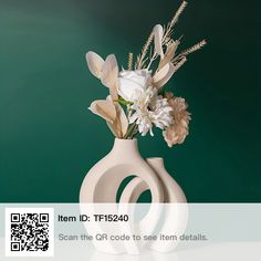 there is a vase with flowers in it and qr code to see them details