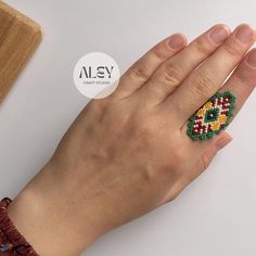 I made this wonderful ring(NIJER) with the highest quality Japanese miyuki beads. I am always careful and attentive while producing our products. And of course, we don't forget to add our love. ❤ Make yourself and your loved ones happy with this bracelet prepared with love and effort. ❤ WHAT IS MIYUKI BEAD? The small size of Miyuki beads, the equal size of each bead, their smooth cut and quality make the jewelry made with these beads unique. Jewelry made with Miyuki beads looks neater and appeal Unique Beaded Rings For Gifts, Green Beaded Rings For Gifts, Green Beaded Rings For Gift, Bohemian Beaded Rings As Gift, Bohemian Rings With Tiny Beads As Gift, Miyuki Bead, Beaded Ring, Miyuki Beads, Mexican Style