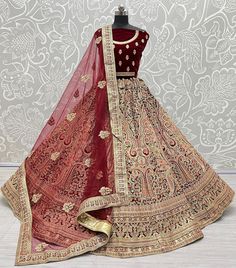 Great art of work in Bollywood Bridal Lehengacholi  Code : A2304 Lehenga : Fabric - velvet  Work - fancy work              Sequins               Dori and Thread work Stitching - standard cancan and canvas attached  Size - free size up to 42 Flair - 3.5 meter plus  Blouse : Fabric - velvet  Work - same as lehenga  Size - 1.2 meter long  Backside - yes work is there  Dupatta : Fabric - softnet  Work - same as lehenga  Size - 2.5 meter long  Weight - 6kg approx Chaniya Choli Hand Work, Choli Hand Work, Hand Work Lehenga, Latest Bridal Lehenga Designs, Lehenga Choli For Women, Bollywood Bridal, Choli For Women, Bridal Lehenga Designs, Latest Bridal Lehenga