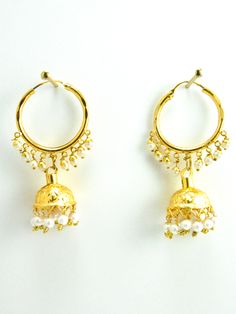 Jhumka gira re!! Strut it with your thumka with this Desi Jhumka. Meet the beautifully gold plated Desi Jhumka with white pearls. These earrings will get everyone talking. Perfect for any jago, sangeet, party and weddings. - Gold Plated Metal, Faux White pearls - Handcrafted in India with love and care - Style No. 1032 - Closure: Continuous Hoop DIMENSIONS Approx 2.5"L, 1"W SHIPPING & RETURNS - Product will be shipped within 1 to 2 weeks from the date of purchase. - Product is non returnable Desi Jhumka, Punjabi Jhumka, Anarkali Kurtis, Designer Lehengas, Jewellery Indian, Kundan Earrings, Bridal Jewellery Indian, Ancient Jewelry, Jhumka Earrings