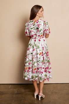 Beautiful floral embroidered dress with flowy sleeves, keyhole back closure, elastic back band in a stunning floral pattern. Self and Lining 100% Polyester Hand wash only. Aprox. measurements in inches: S:Length of self-45.5, length of lining-42 |Bust-35 |Waist-28 M:Length of self-46, length of lining-42.5 |Bust-37 |Waist-30 L:Length of self-47, length of lining-43.5 |Bust-39 |Waist-32 XL:Length of self-47, length of lining-43.5 |Bust-42 |Waist-36 modest dresses, modest dress, modest midi, modes Feminine Midi Floral Embroidered Dress, Feminine Midi Floral Dress With Embroidery, Spring Floral Embroidered Midi Dress, Feminine Floral Embroidered Midi Dress, Floral Embroidered Midi Dress For Spring, Spring Midi Dress With Floral Embroidery, Floral Embroidery Midi Dress For Garden Party, Feminine Midi Dress With Floral Embroidery, Feminine A-line Midi Dress With Floral Embroidery